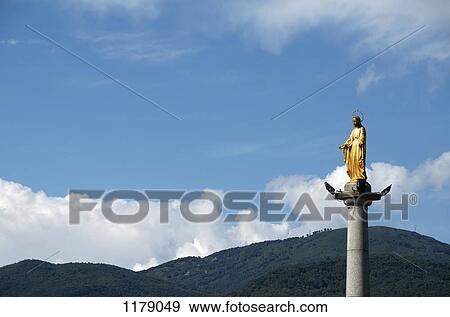 Golden statue of Virgin Mary View Large Photo Image Stock Photo - Golden statue of Virgin Mary . Fotosearch