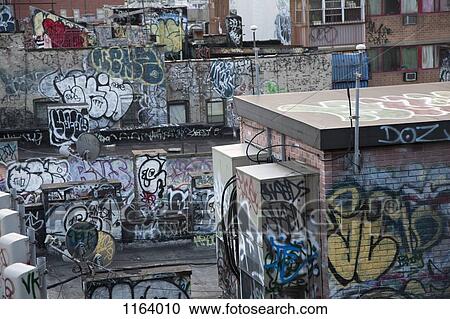 Graffiti covered tenement rooftop in Chinatown View Large Photo Image Stock Image - Graffiti covered tenement rooftop in Chinatown. Fotosearch