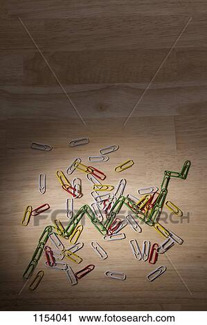 Green paperclips connected to look like a line on a line graph View Large Photo Image Stock Image - Green paperclips connected to look like a line on a line graph . Fotosearch