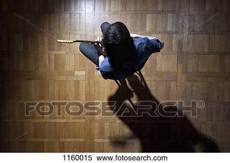Guitarist in the spotlight View Large Photo Image Stock Photography - Guitarist in the spotlight. Fotosearch