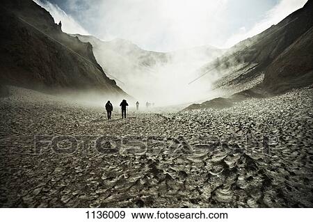 Hikers trekking through the Mutnovsky Volcano, Kamchatka, Russia View Large Photo Image Stock Photo - Hikers trekking through the Mutnovsky Volcano, Kamchatka, Russia. Fotosearch
