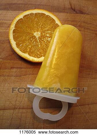 Stock Photography - Homemade ice pop and slice of orange. Fotosearch