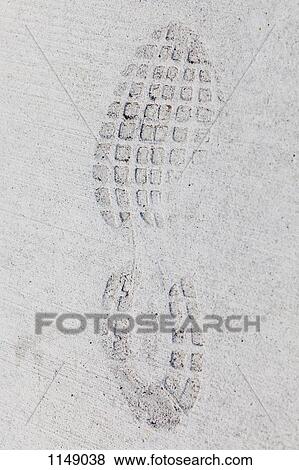 Imprint of a sports shoe in concrete View Large Photo Image Stock Photo - Imprint of a sports shoe in concrete. Fotosearch