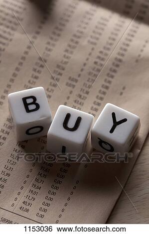 Lettered cubes spelling BUY lying on top of a financial page View Large Photo Image Stock Photograph - Lettered cubes spelling BUY lying on top of a financial page. Fotosearch