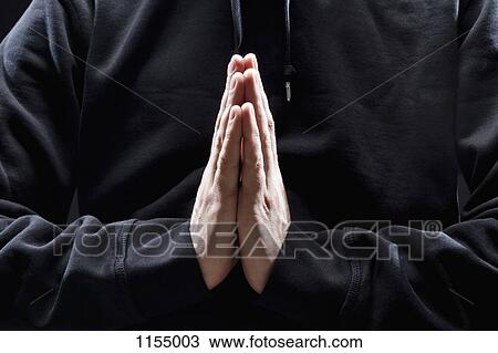 Man with prayer hands View Large Photo Image Stock Image - Man with prayer hands. Fotosearch