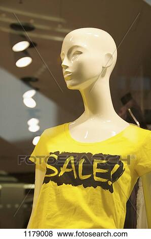Mannequin advertising a sale View Large Photo Image Stock Photo - Mannequin advertising a sale. Fotosearch