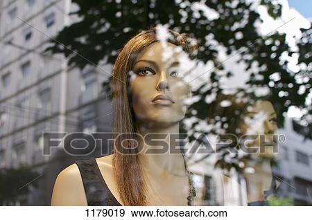 Mannequins looking at the street buildings View Large Photo Image Stock Photo - Mannequins looking at the street buildings. Fotosearch