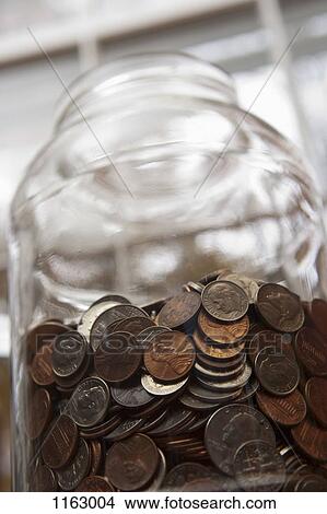 Money jar of US coins View Large Photo Image Picture - Money jar of US coins. Fotosearch