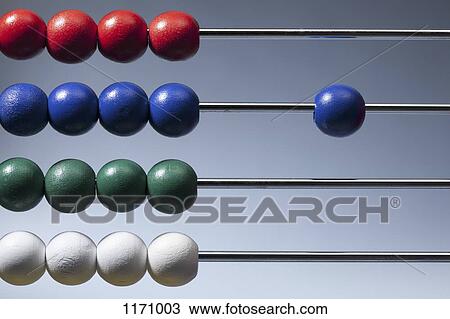 Neat rows of colored beads on an abacus with a single blue bead to the side View Large Photo Image Stock Image - Neat rows of colored beads on an abacus with a single blue bead to the side. Fotosearch