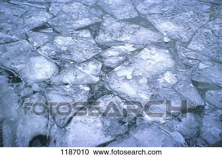 Patterns of cracked ice on river View Large Photo Image Stock Image - Patterns of cracked ice on river. Fotosearch