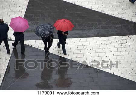 Pedestrians below with umbrellas View Large Photo Image Stock Image - Pedestrians below with umbrellas. Fotosearch