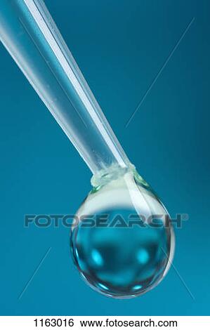 Pipette and droplet View Large Photo Image Stock Photograph - Pipette and droplet. Fotosearch