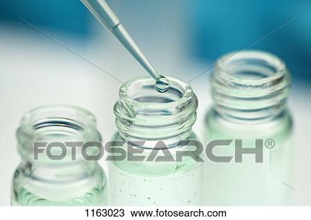 Pipette over 3 glass jars View Large Photo Image Stock Image - Pipette over 3 glass jars. Fotosearch