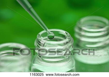 Pipette over 3 glass jars View Large Photo Image Stock Photography - Pipette over 3 glass jars. Fotosearch