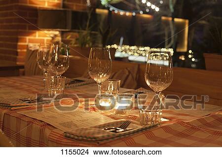 Place settings in restaurant View Large Photo Image Picture - Place settings in restaurant. Fotosearch