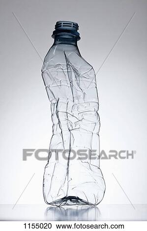 Stock Image - Plastic bottle out of shape. Fotosearch