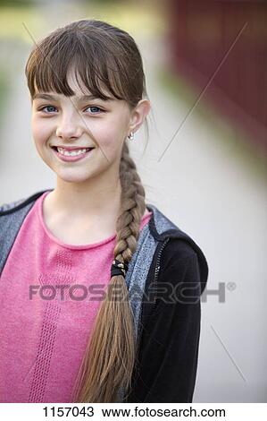 Portrait of a girl smiling View Large Photo Image Stock Image - Portrait of a girl smiling. Fotosearch