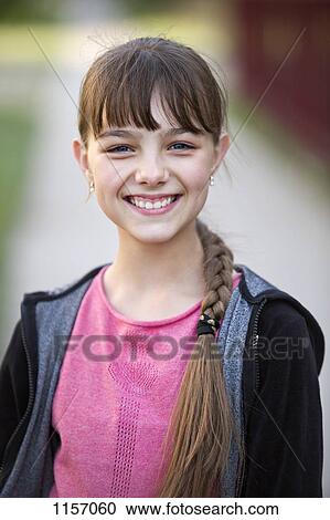 Portrait of a girl smiling View Large Photo Image Stock Image - Portrait of a girl smiling. Fotosearch