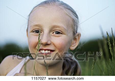 Portrait of a girl smiling View Large Photo Image Stock Photo - Portrait of a girl smiling. Fotosearch