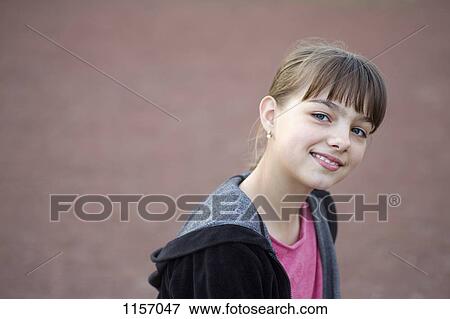 Portrait of a girl smiling View Large Photo Image Stock Photo - Portrait of a girl smiling. Fotosearch
