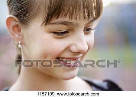 Stock Photo - Portrait of a girl. Fotosearch