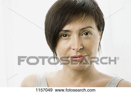 Portrait of a mature woman View Large Photo Image Stock Photo - Portrait of a mature woman. Fotosearch