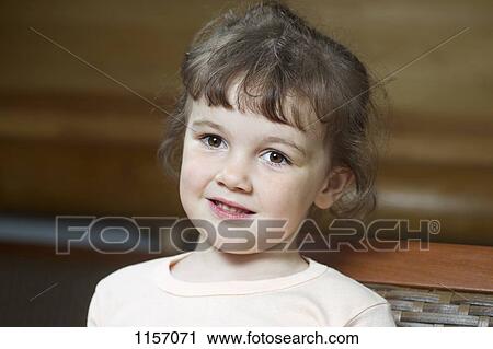 Portrait of a young girl View Large Photo Image Stock Image - Portrait of a young girl. Fotosearch