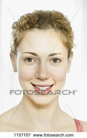Stock Photo - Portrait of a young woman. Fotosearch