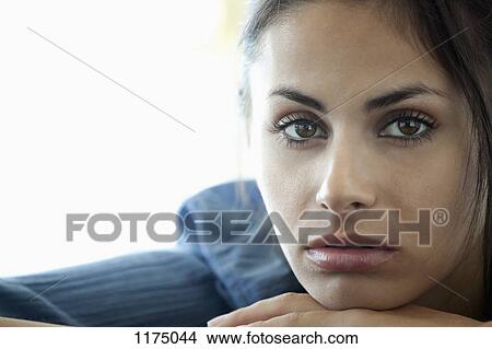 Portrait of pensive woman with reflection in eyes View Large Photo Image Picture - Portrait of pensive woman with reflection in eyes. Fotosearch