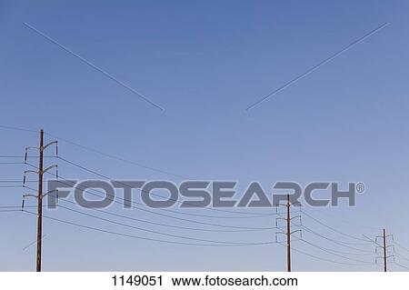 Stock Image - Power lines against a clear sky. Fotosearch