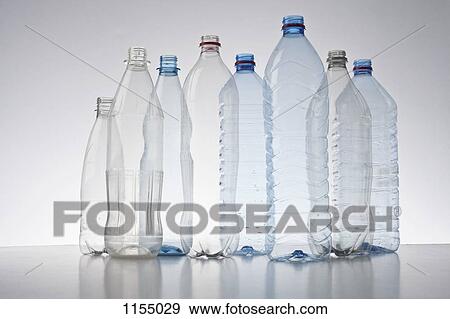Row of plastic bottles View Large Photo Image Stock Photo - Row of plastic bottles. Fotosearch