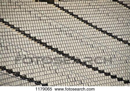 Stock Photography - Rows of empty seats in sport stadium. Fotosearch