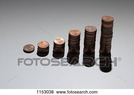Stock Photo - Rows of stacks of five cent Euro coins increasing in size. Fotosearch
