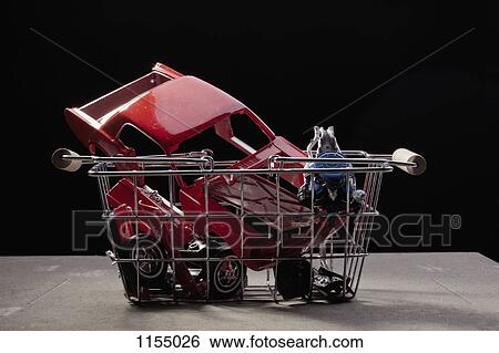 Shopping basket of car parts View Large Photo Image Stock Photograph - Shopping basket of car parts. Fotosearch