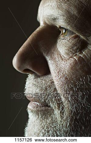 Stock Photograph - Side view of a mature man. Fotosearch
