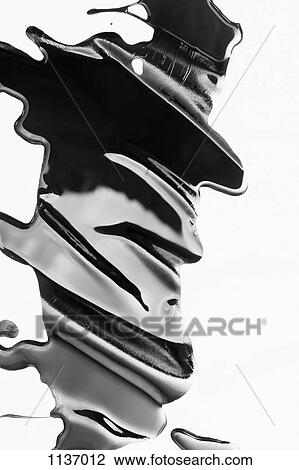 Spilled black paint making an abstract shape on white background View Large Photo Image Stock Image - Spilled black paint making an abstract shape on white background. Fotosearch
