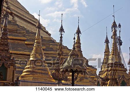 Spires on an ornate temple in Yangon, Burma View Large Photo Image Stock Photography - Spires on an ornate temple in Yangon, Burma. Fotosearch