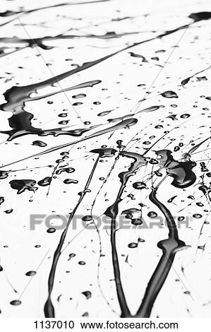 Splattered black paint making a complex abstract pattern on a white surface View Large Photo Image Stock Image - Splattered black paint making a complex abstract pattern on a white surface. Fotosearch