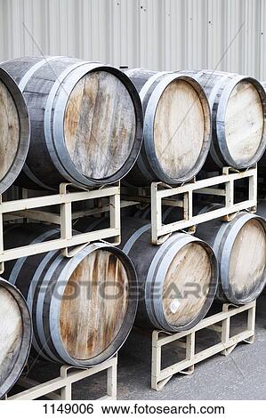 Stacked wine barrels at a winery View Large Photo Image Stock Photograph - Stacked wine barrels at a winery. Fotosearch