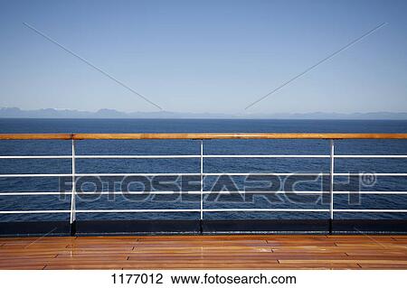 Sun shining on the boat deck of a passenger ship, Canadian coastline in background View Large Photo Image Stock Image - Sun shining on the boat deck of a passenger ship, Canadian coastline in background. Fotosearch