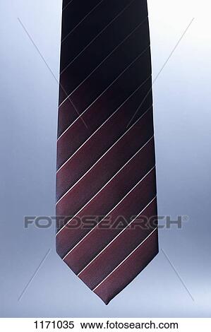 The bottom of a striped, silk necktie View Large Photo Image Stock Photography - The bottom of a striped, silk necktie. Fotosearch
