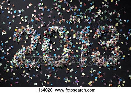 The year 2013 spelled out with confetti View Large Photo Image Stock Photo - The year 2013 spelled out with confetti . Fotosearch