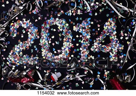The year 2014 spelled out with confetti and surrounded by streamers View Large Photo Image Stock Image - The year 2014 spelled out with confetti and surrounded by streamers. Fotosearch