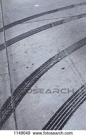 Tire marks on concrete View Large Photo Image Stock Photo - Tire marks on concrete. Fotosearch
