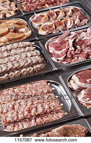 Stock Photo - Trays of meat. Fotosearch