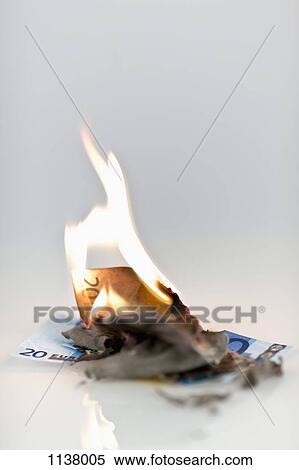 Two twenty euro banknotes on fire View Large Photo Image Stock Photography - Two twenty euro banknotes on fire. Fotosearch