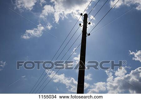 Utility pole silhouette View Large Photo Image Picture - Utility pole silhouette. Fotosearch
