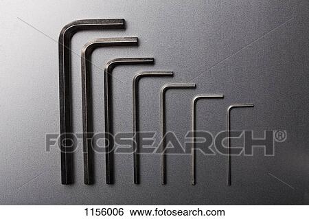 Stock Photograph - Various sizes of Allen wrenches in a neat row. Fotosearch