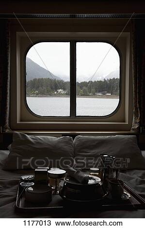 View of Juneau, Alaska thru bedroom window of a passenger ship View Large Photo Image Stock Image - View of Juneau, Alaska thru bedroom window of a passenger ship. Fotosearch