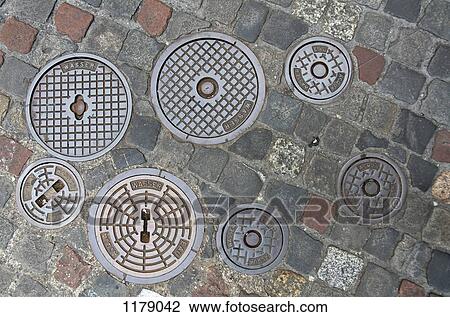 View of manhole covers View Large Photo Image Stock Image - View of manhole covers. Fotosearch